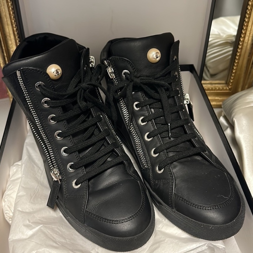CHANEL Black Leather High-Top Sneakers with Silver Hardware
